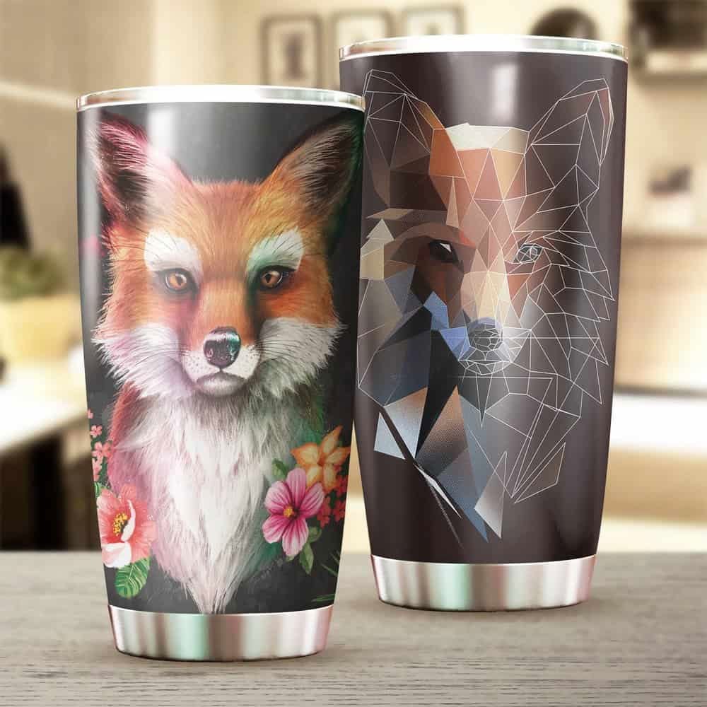 Vaso con forma de zorro y flores