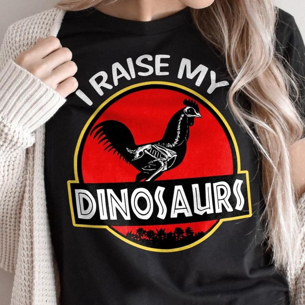 Camisetas de pollo con el lema "Crío a mis dinosaurios"