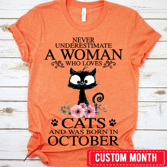 Nunca subestimes a una anciana que ama a los gatos y nació en octubre. Camisetas de cumpleaños personalizadas