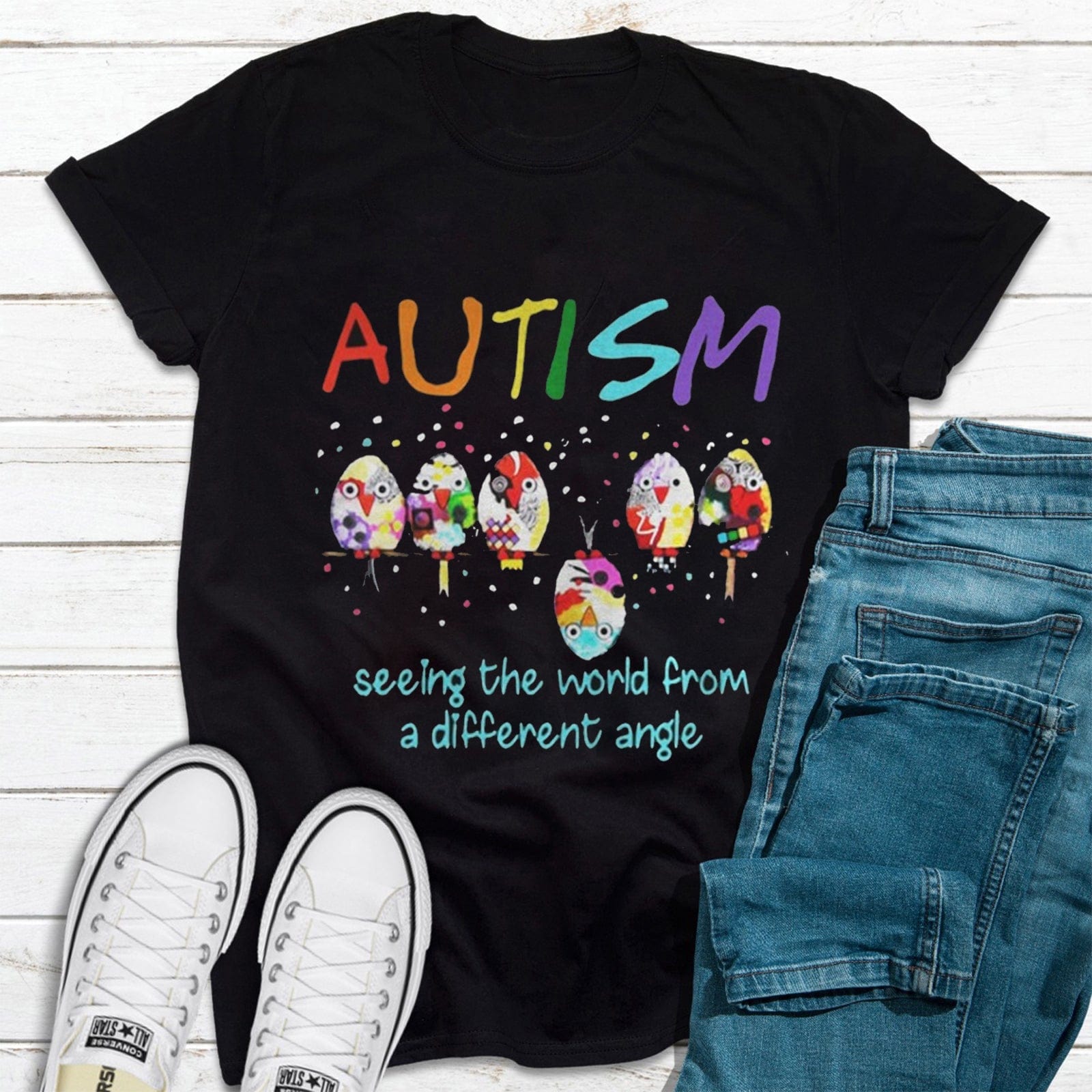 Camiseta de concienciación sobre el autismo con aves que ven el mundo desde un ángulo diferente