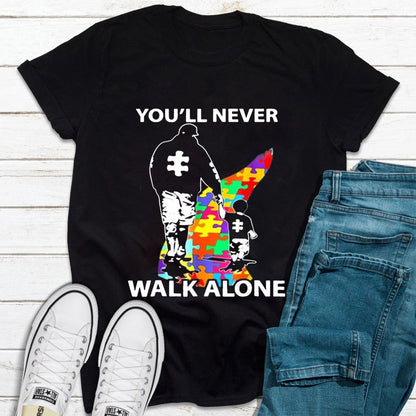 Camiseta de concienciación sobre el autismo "Nunca caminarás solo", padre e hijo
