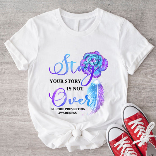 Camiseta con el lema "Tu historia no ha terminado", con concienciación sobre la prevención del suicidio, color rosa