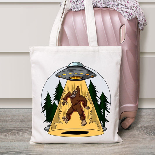 Bolsa de mano con diseño de extraterrestre y Bigfoot