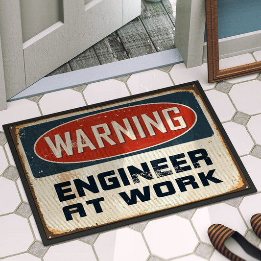 Felpudo de advertencia de ingeniero en el trabajo
