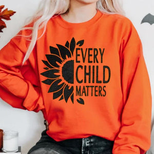 Cada niño importa, Día de la camiseta naranja con girasol