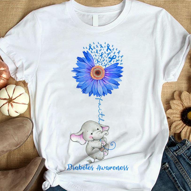 Camiseta de apoyo a la concienciación sobre la diabetes con el elefante de la fe y la margarita de la cinta