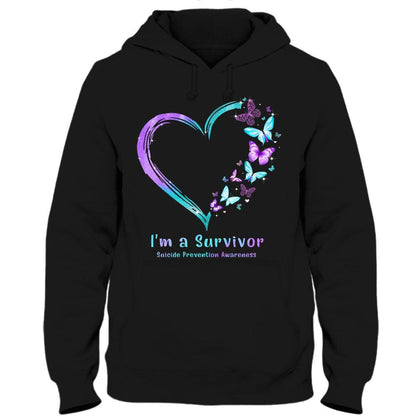Camiseta con el mensaje "Soy un sobreviviente" para concienciar sobre la prevención del suicidio y el corazón de mariposa