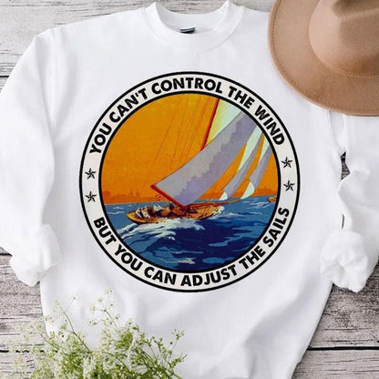 No puedes controlar el viento pero puedes ajustar las velas Camisetas de navegación