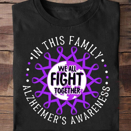 En esta familia luchamos todos juntos, camiseta con lazo morado y concienciación sobre el Alzheimer