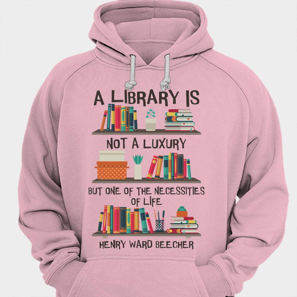 Una biblioteca no es un lujo, sino una necesidad. Libros Camisetas