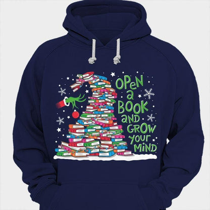 Camisetas navideñas con el lema "Abre un libro y haz crecer tu mente"