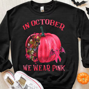 En octubre usamos una camiseta rosa con forma de calabaza de Halloween contra el cáncer de mama