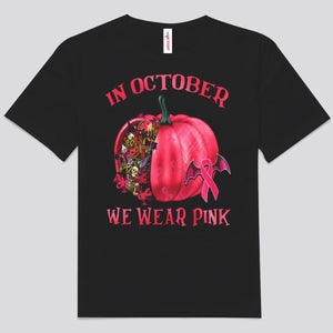 En octubre usamos una camiseta rosa con forma de calabaza de Halloween contra el cáncer de mama