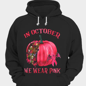 En octubre usamos una camiseta rosa con forma de calabaza de Halloween contra el cáncer de mama