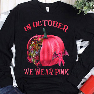 En octubre usamos una camiseta rosa con forma de calabaza de Halloween contra el cáncer de mama