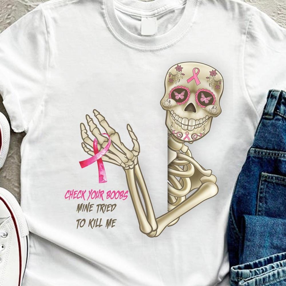 Revisa tus senos. La mía intentó matarme. Camisetas de esqueletos sobre cáncer de mama.