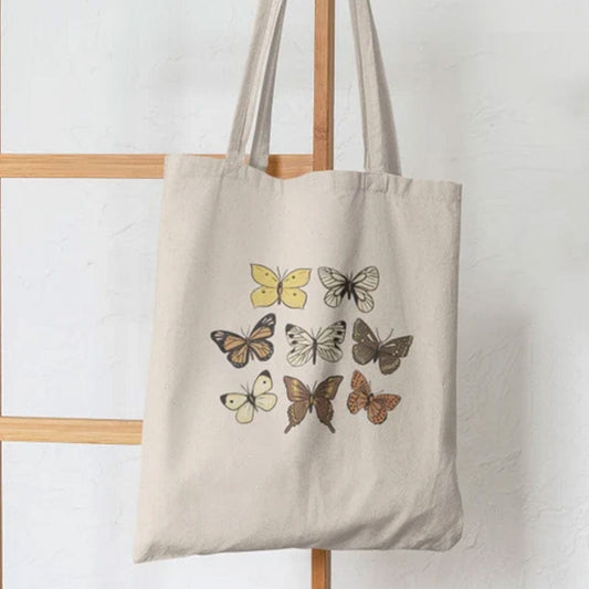 Preciosa bolsa de mano con forma de mariposa