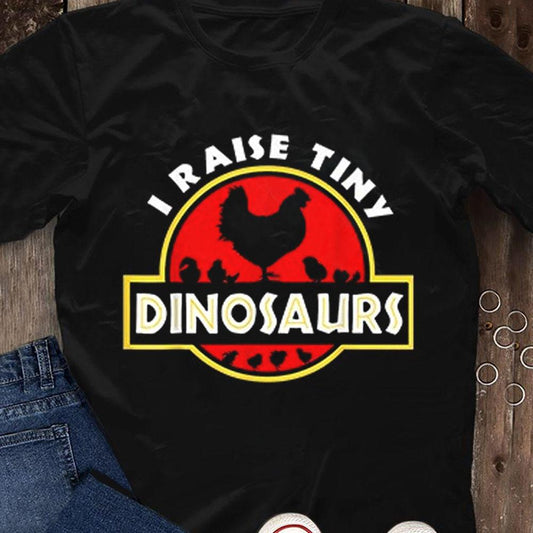 Camisetas de pollos con el lema "Crío pequeños dinosaurios"