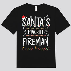 Camisetas navideñas de bomberos con el bombero favorito de Papá Noel