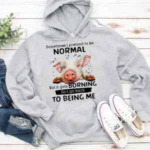 A veces pretendo ser normal, pero me aburre. Sudadera con capucha y camiseta de cerdo