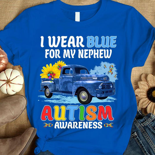 Llevo puesto el azul por mi sobrino, camiseta de concienciación sobre el autismo con un girasol y un coche en forma de pieza de rompecabezas