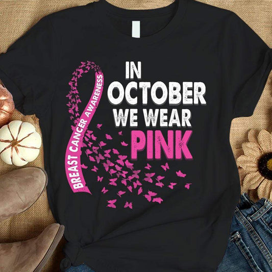 En octubre usamos camiseta rosa con lazo de mariposa y concienciación sobre el cáncer de mama