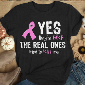 Sí, son falsos. Los verdaderos intentaron matarme. Sudadera con capucha y camiseta de cáncer de mama.