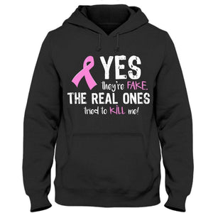 Sí, son falsos. Los verdaderos intentaron matarme. Sudadera con capucha y camiseta de cáncer de mama.