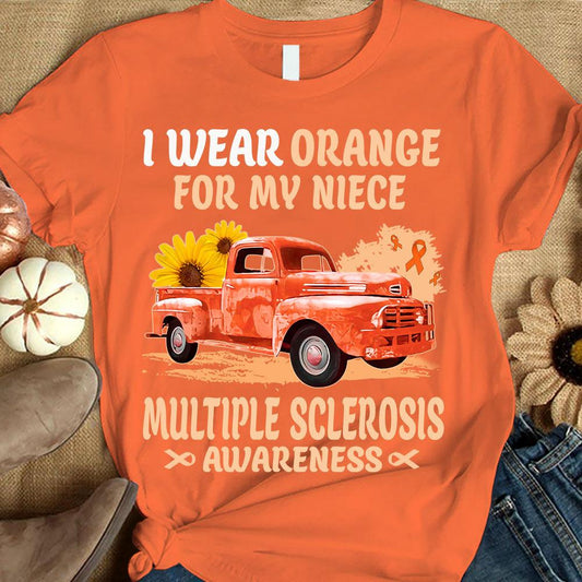Llevo naranja por mi sobrina, camiseta con lazo, girasol y coche, para concienciar sobre la esclerosis múltiple