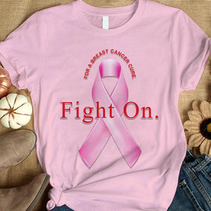 Camiseta con lazo rosa y mensaje "Sigue luchando" para concientizar a los sobrevivientes del cáncer de mama