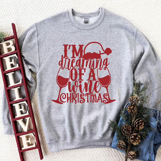 Camisetas navideñas con el mensaje "Estoy soñando con vino"